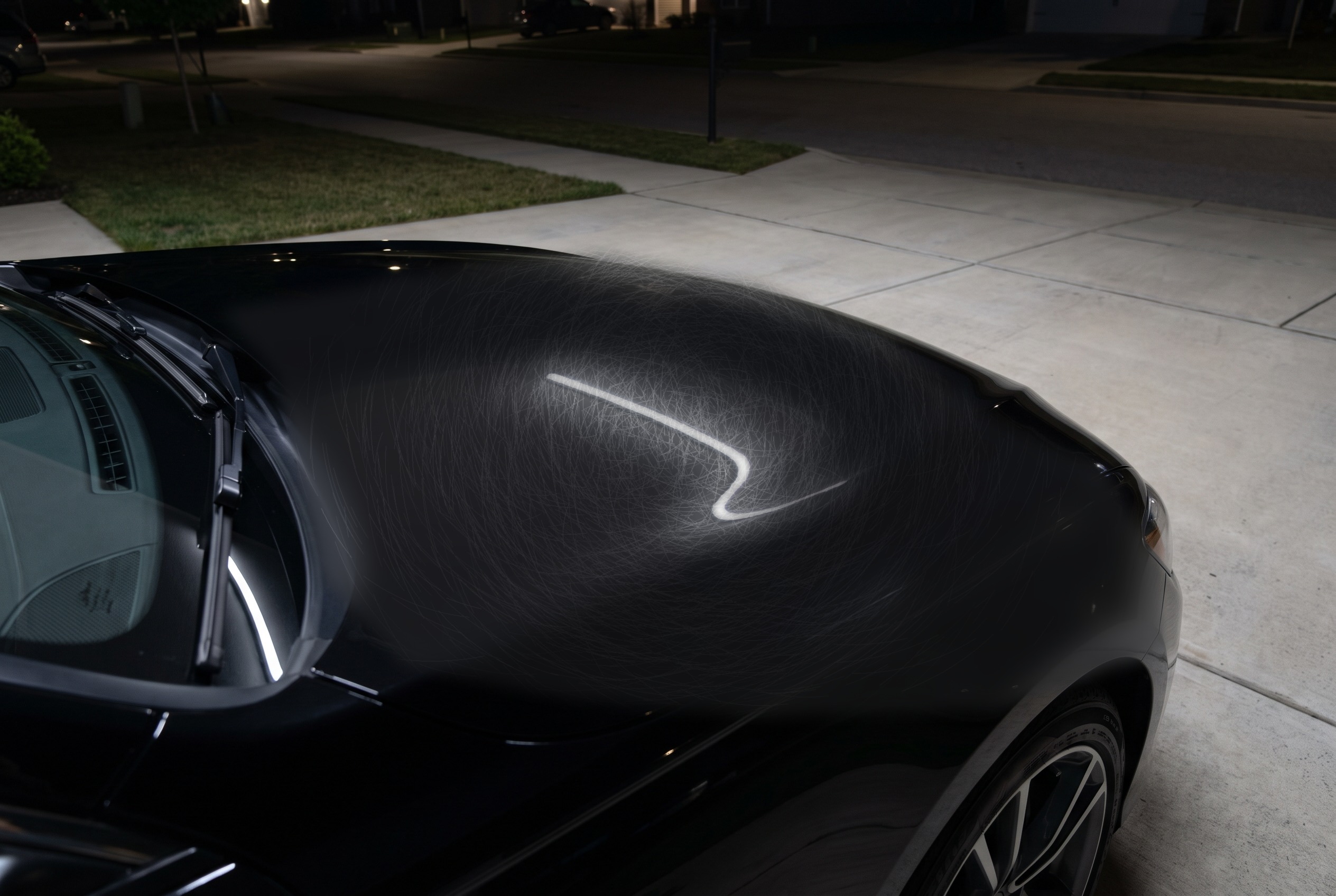 Dull swirled paint on an uncoated hood